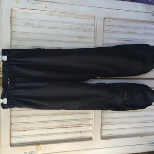 Columbia, men's black full side zip ski/ snow pants. Large